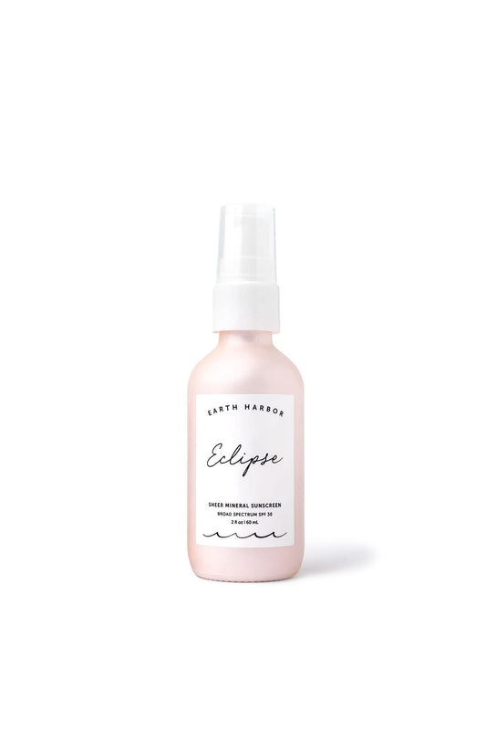 Earth Harbor Eclipse sunscreen bottle front view highlighting sheer mineral protection