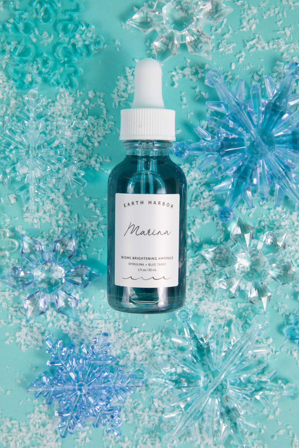 Earth Harbor Marina Biome Ampoule on skin delivering dewy glow and even tone