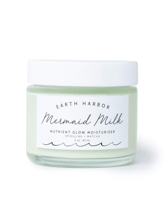 Earth Harbor Mermaid Milk bottle closeup showing lightweight hydration for daily use