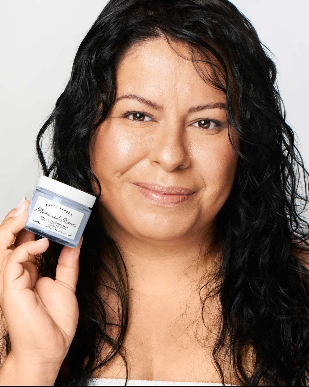 Spoon of Mermaid Moon balm highlights rich formula and clean ingredients