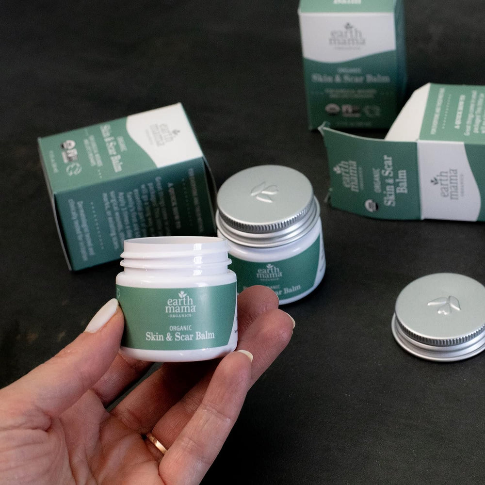 Earth Mama Organic Skin Scar Balm application demonstrates smooth, even coverage.