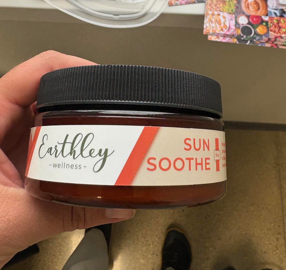 Earthley Wellness Sun Soothe bottle application shows calm, non greasy hydration after sun exposure.