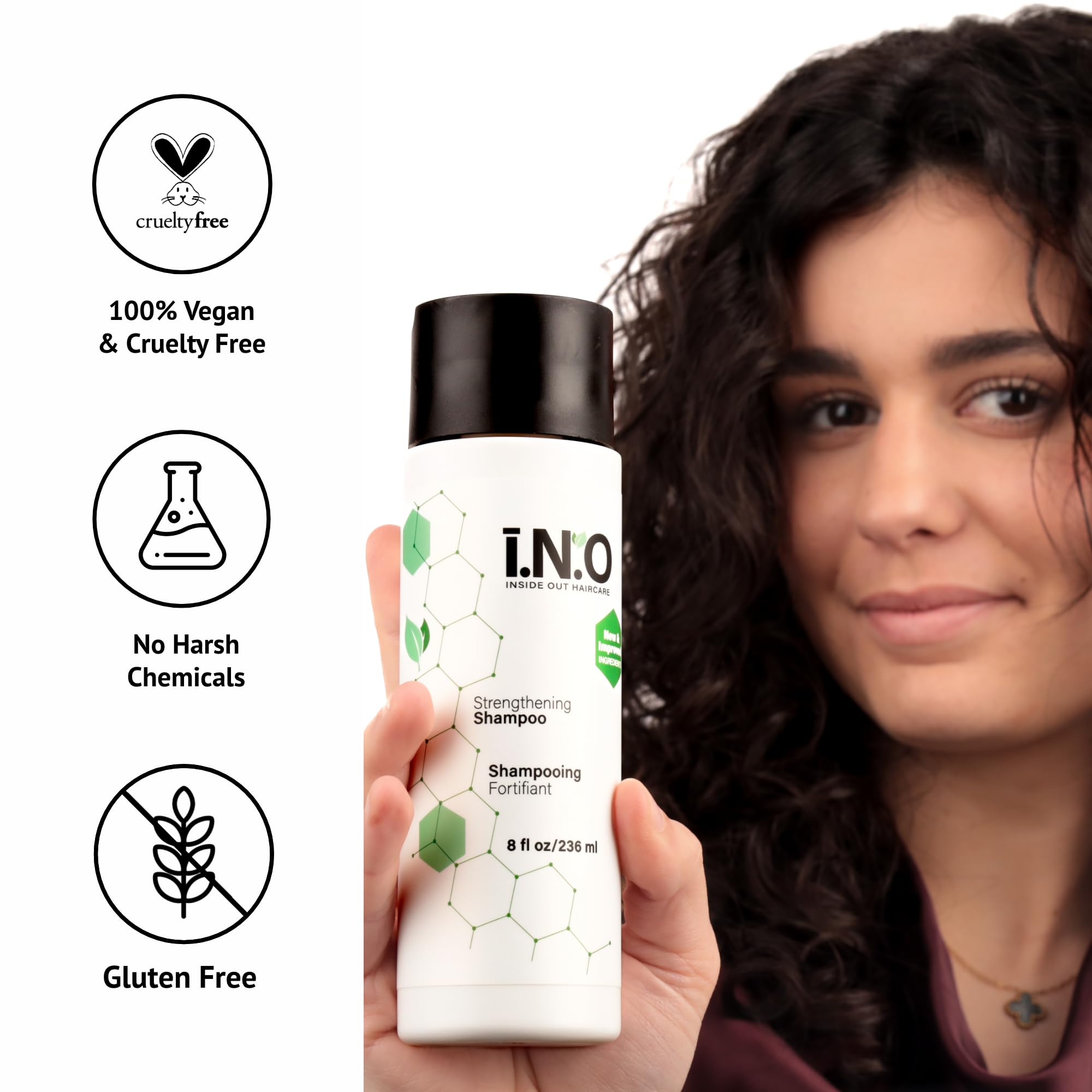 Earthly Body Inside Out Shampoo bottle with towel-ready shower setup.
