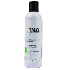 Earthly Body Inside Out Shampoo bottle closeup shows color-safe formula for all hair types.