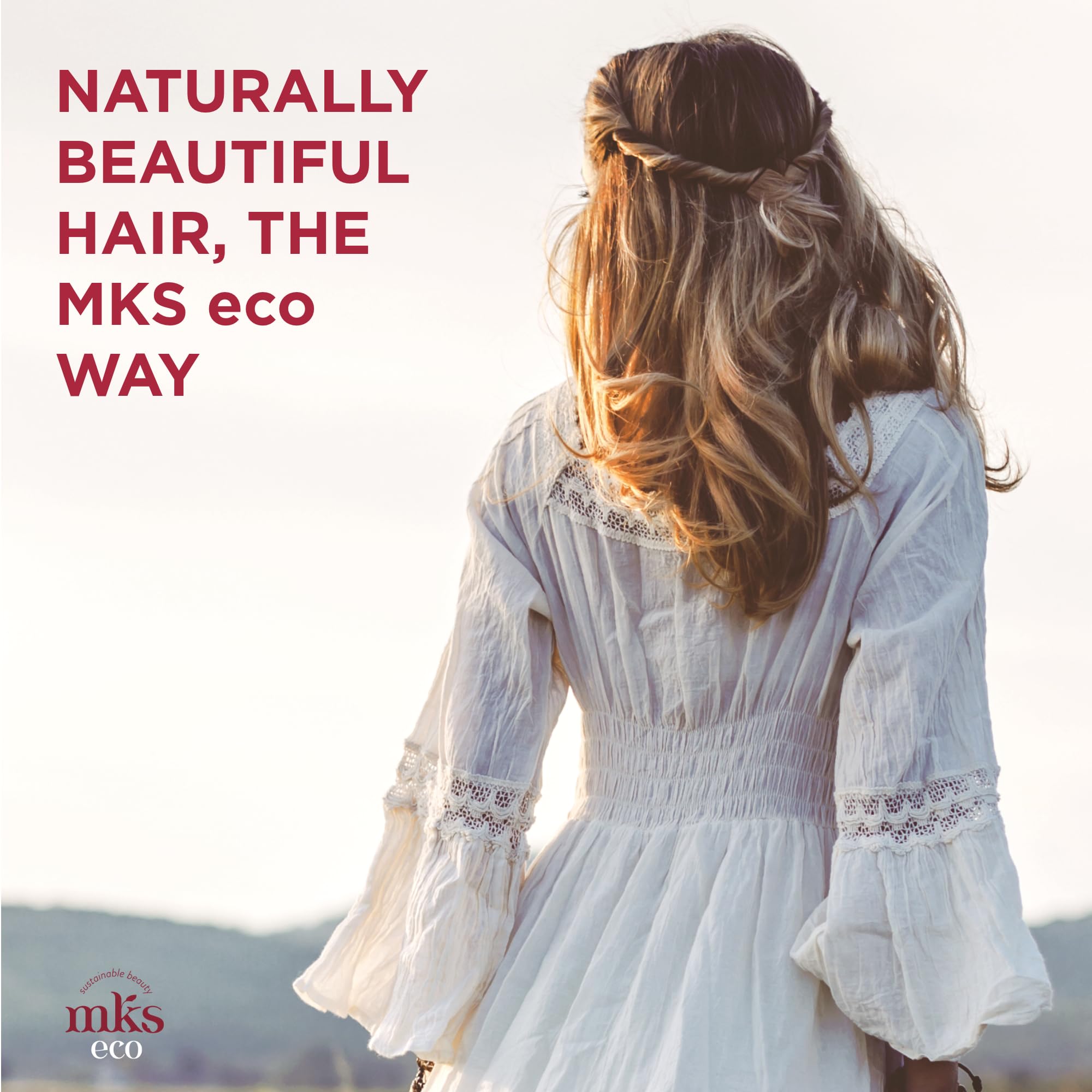 Earthly Body MKS eco Hydrate Conditioner dispenser shows smoothing, manageable hair results.