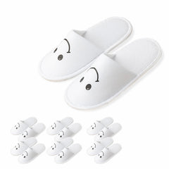 ECEOCC kids slippers with smiley design and soft fabric for cozy hotel stays