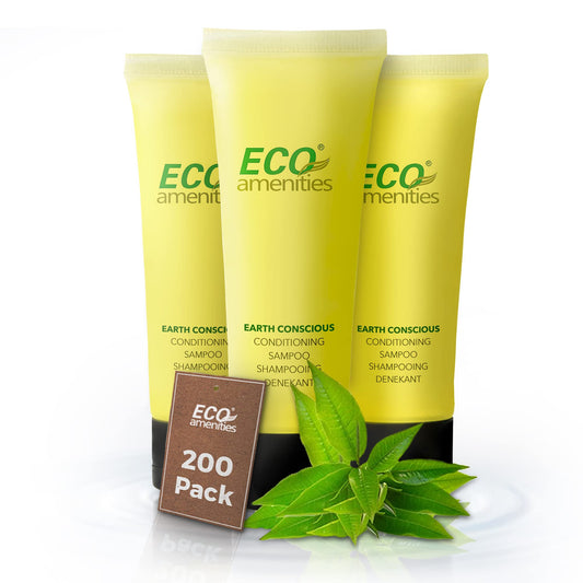 Eco Amenities 2-in-1 travel shampoo and conditioner bottle with green tea scent for on-the-go freshness.