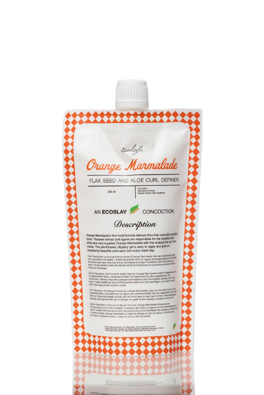 Ecoslay Orange Marmalade bottle pouring, controlled application for defined curls.