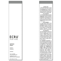 ECRU New York Setting Spray mist on hair showing heat protection in styling.