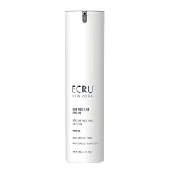 Ecru New York Silk Nectar bottle pour demonstrates light heat protection.