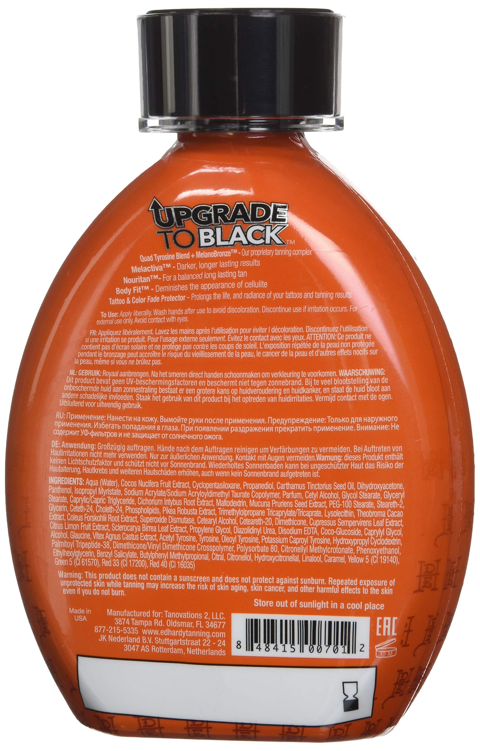 Ed Hardy Upgrade to Black Triple Black Bronzer being applied for an even, long-lasting tan.