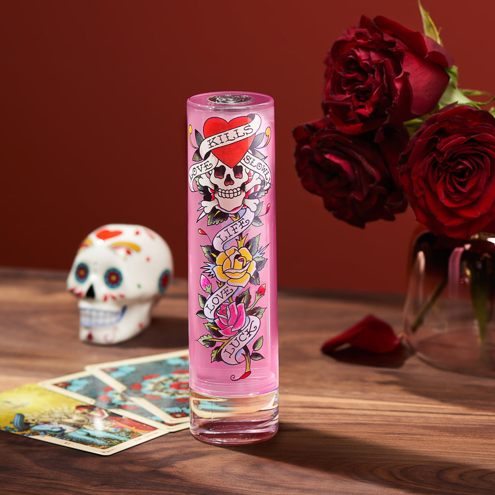 Ed Hardy EdP bottle on a vanity with soft lighting for daily wear.