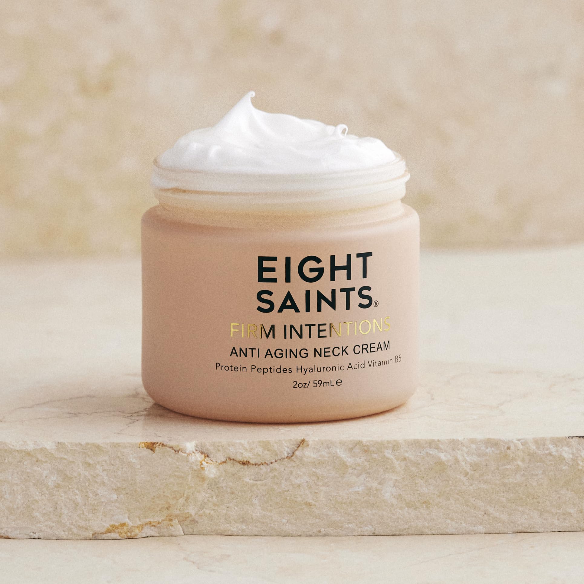 Eight Saints neck cream jar showing rich texture for firming neck skin