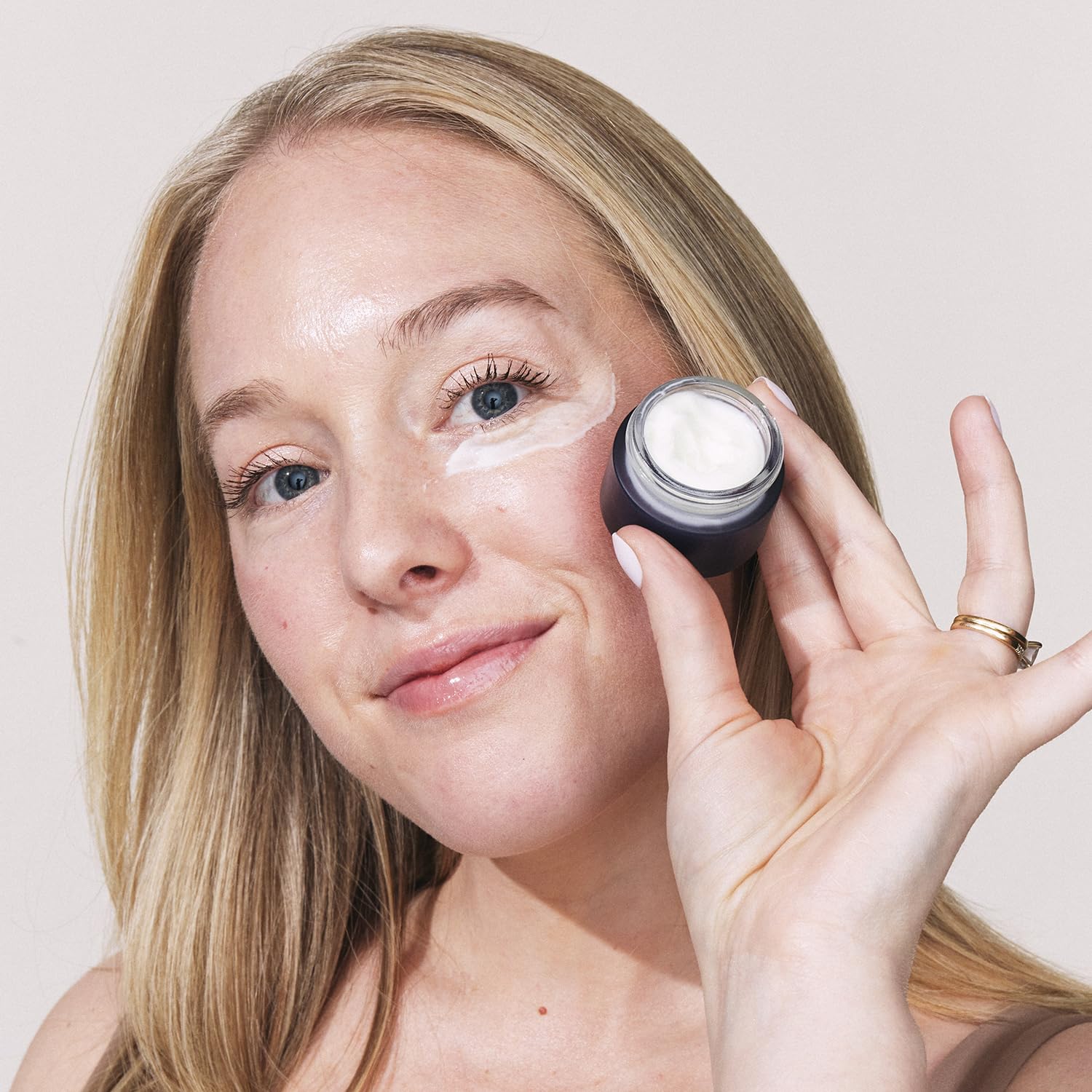 Eight Saints retinol eye cream application on skin, massage-ready for nightly routine.