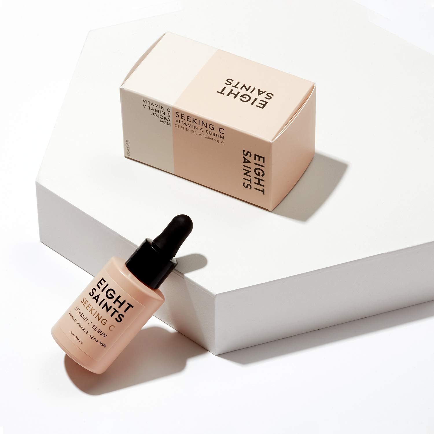 Dropper applying Eight Saints serum for precise dosing