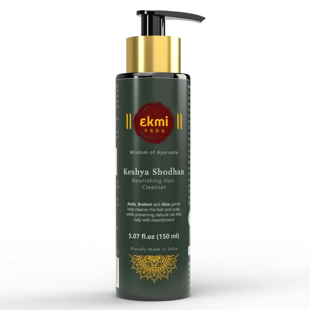 EKMIVEDA Keshya Shodhan bottle pour promotes gentle scalp cleansing.