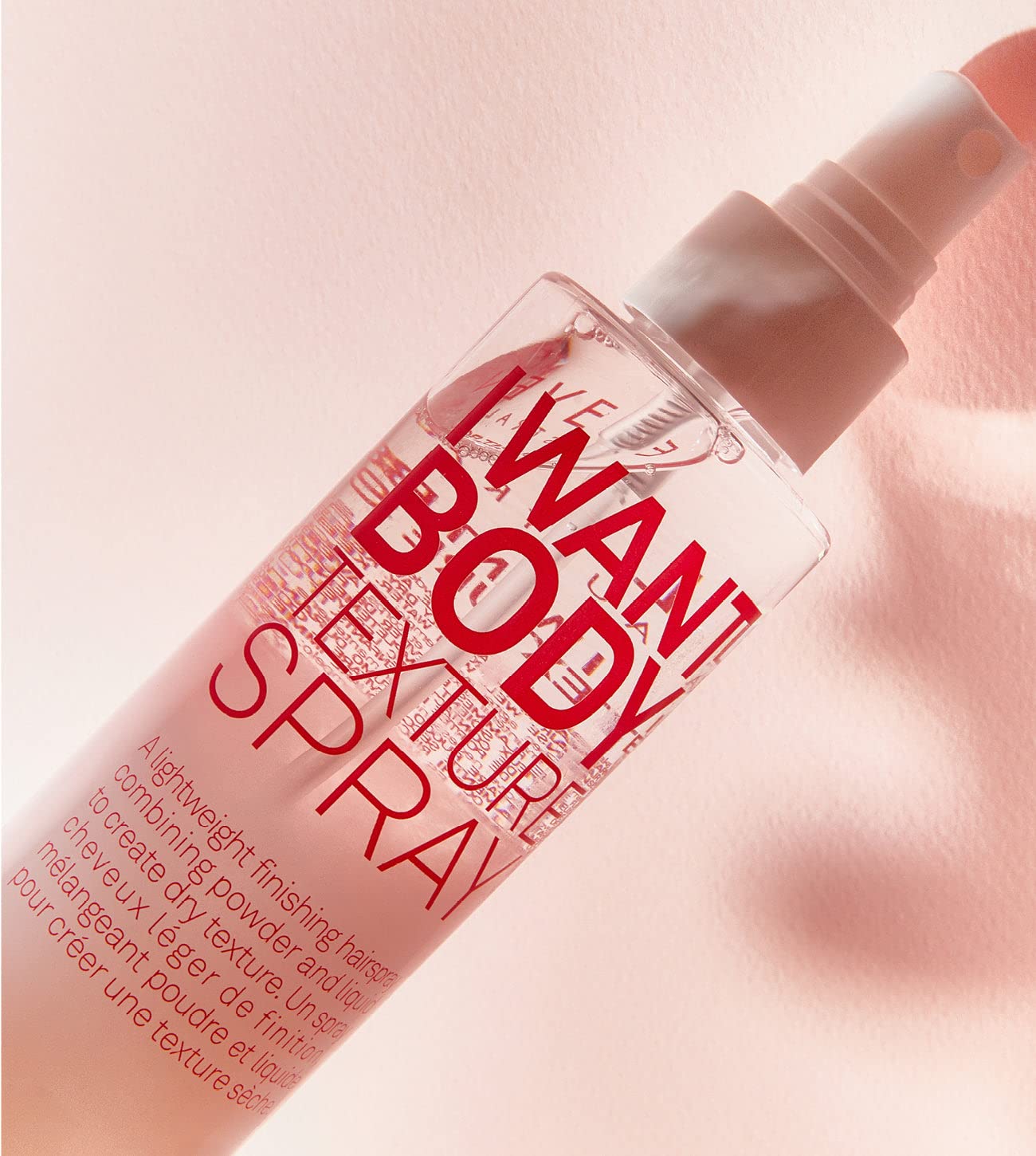ELEVEN AUSTRALIA I Want Body Texture Spray hands applying texture for grips.