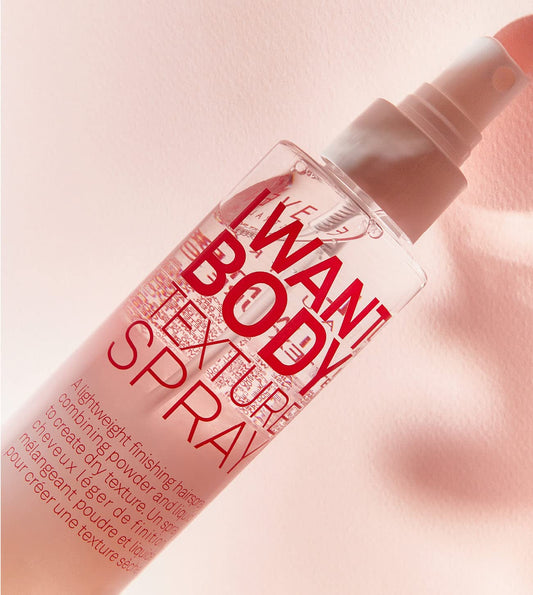 ELEVEN AUSTRALIA I Want Body Texture Spray hands applying texture for grips.
