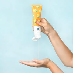 Elizabeth Mott Vitamin C Cleanser texture close-up, cushiony gel that lathers with water.