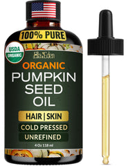 Ella & Eden pumpkin seed oil bottle highlighting organic purity for hair care.
