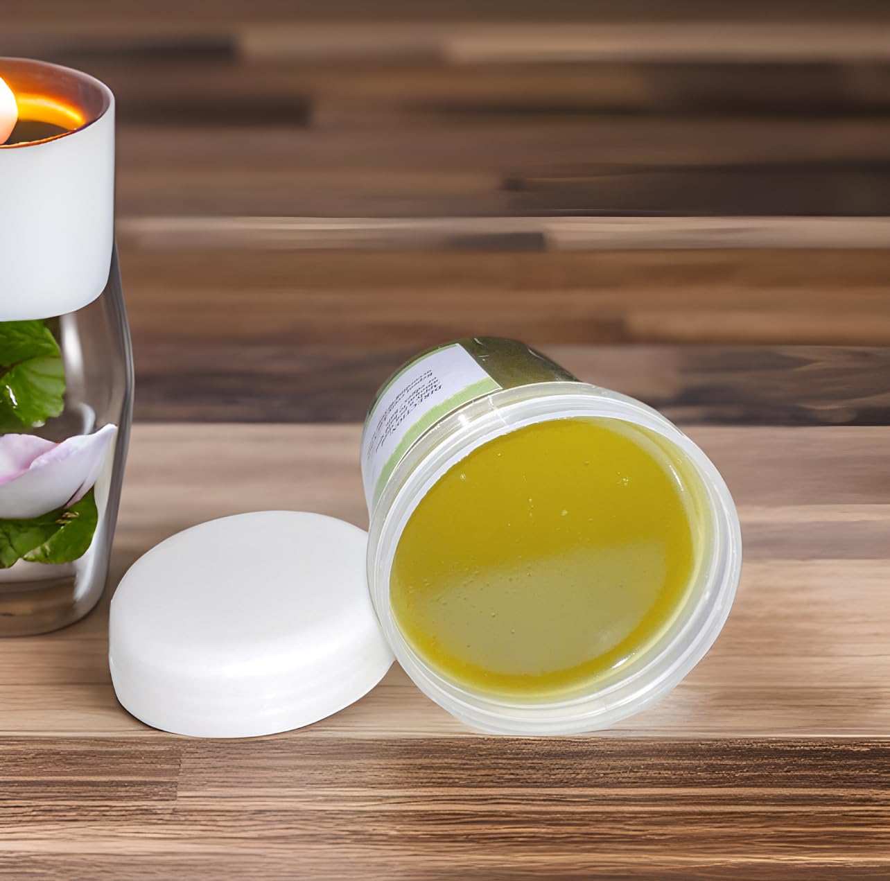 Ingredients closeup: Chebe powder, Karkar oil and herbs in Ella Chebe Hair Grease