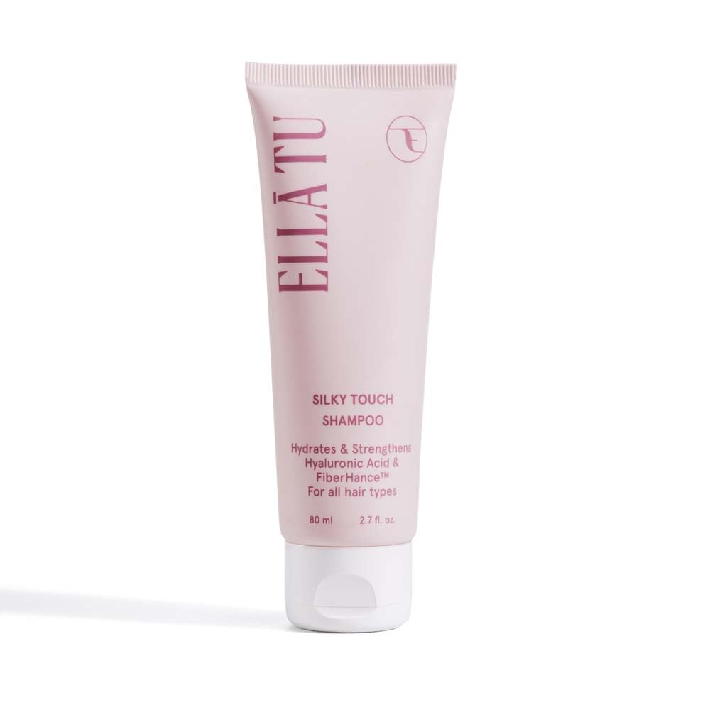 EllaTu Ellātu Silky Touch travel-size bottle for on-the-go moisture and easy styling.