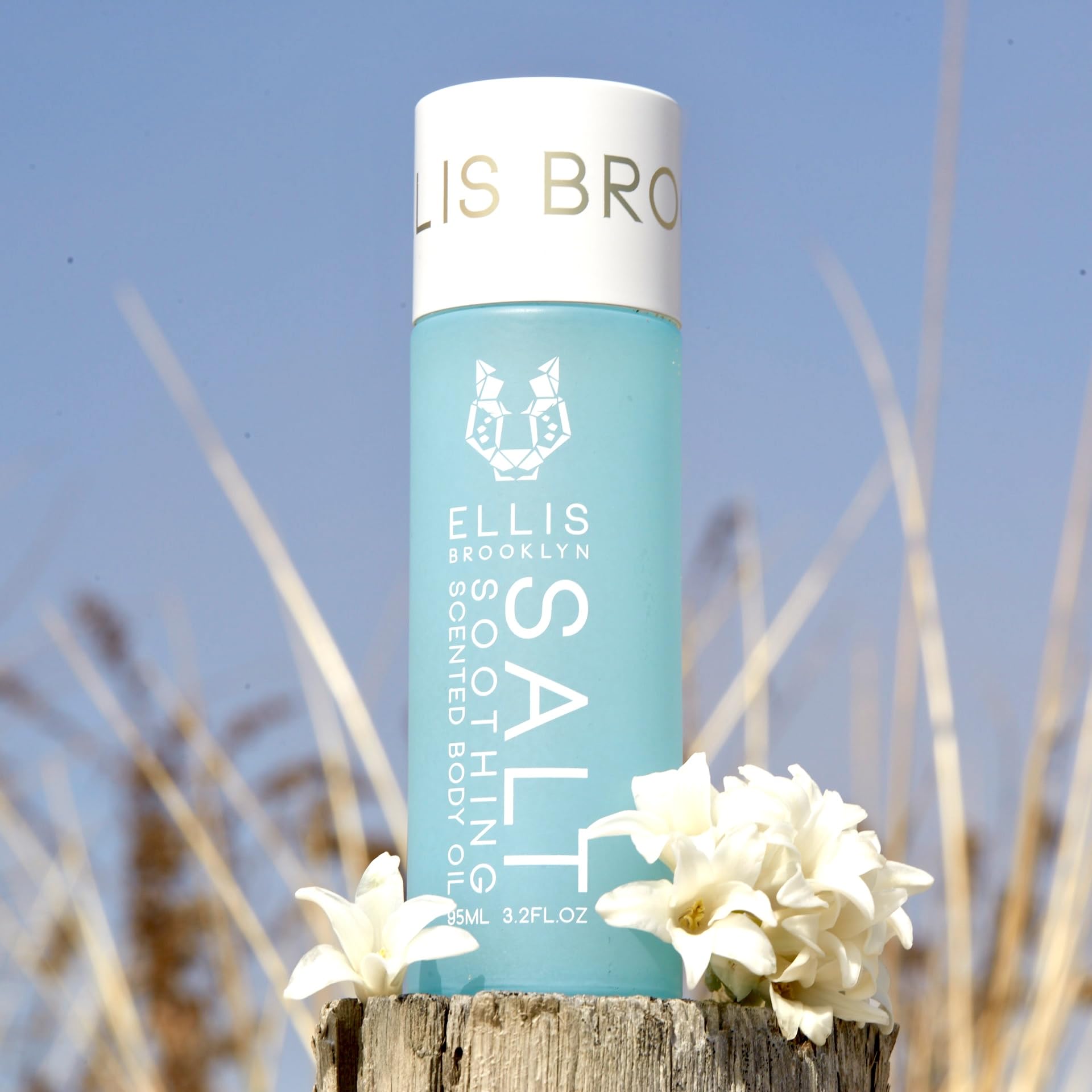 Packaging of Ellis Brooklyn SALT Body Oil showcasing sustainable branding and USA-made quality.