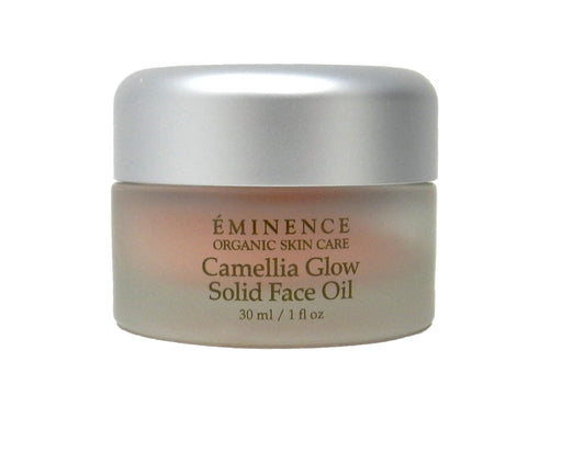 Eminence Camellia Glow solid face oil in a jar delivering radiant hydration.