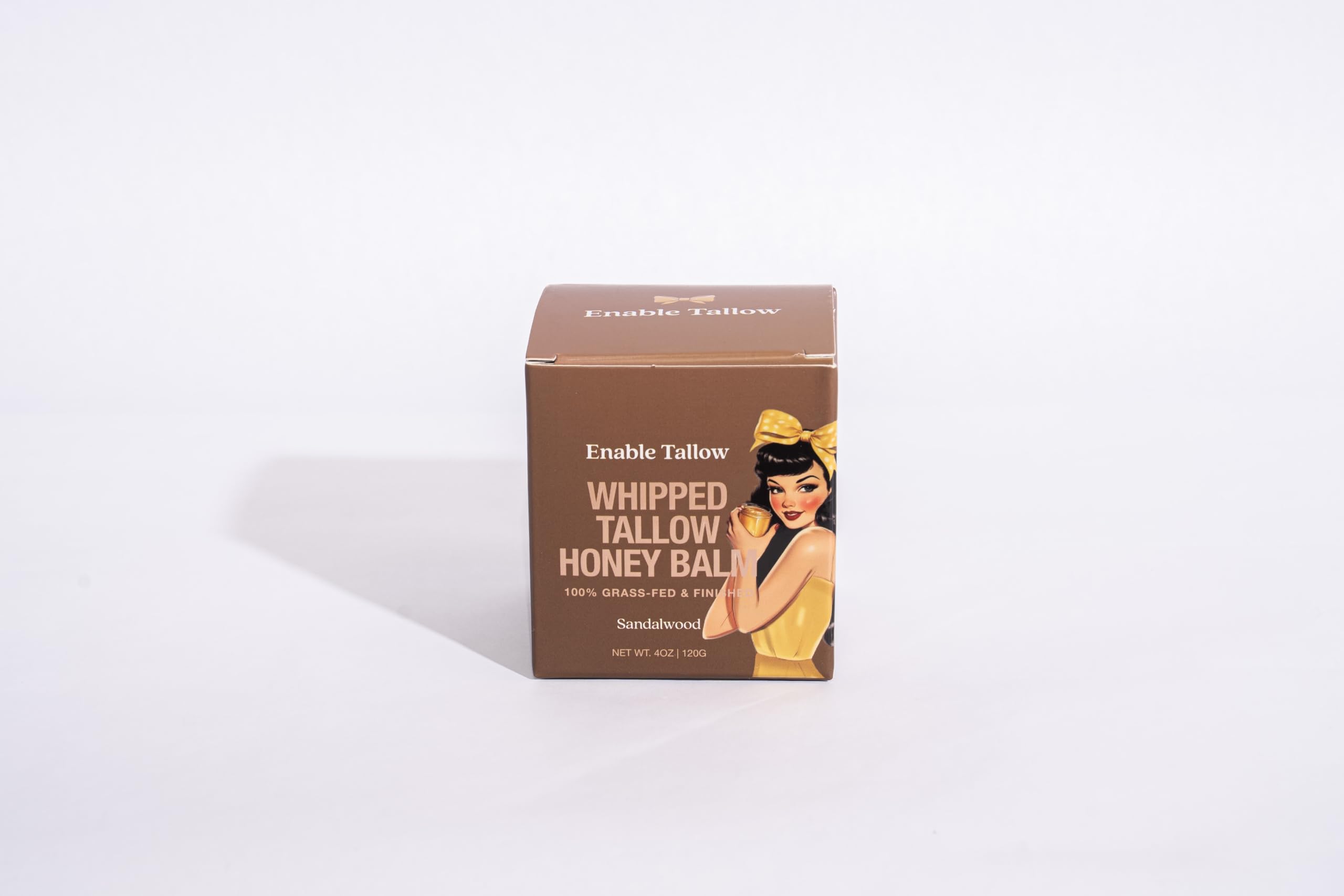 Enable Tallow applying cream to dry skin image demonstrates daily use.