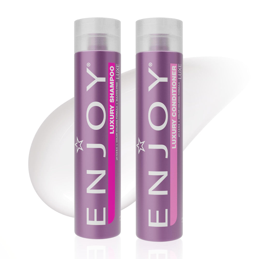 Enjoy Luxury Shampoo & Conditioner bottle set for premium cleanse and sleek finish.