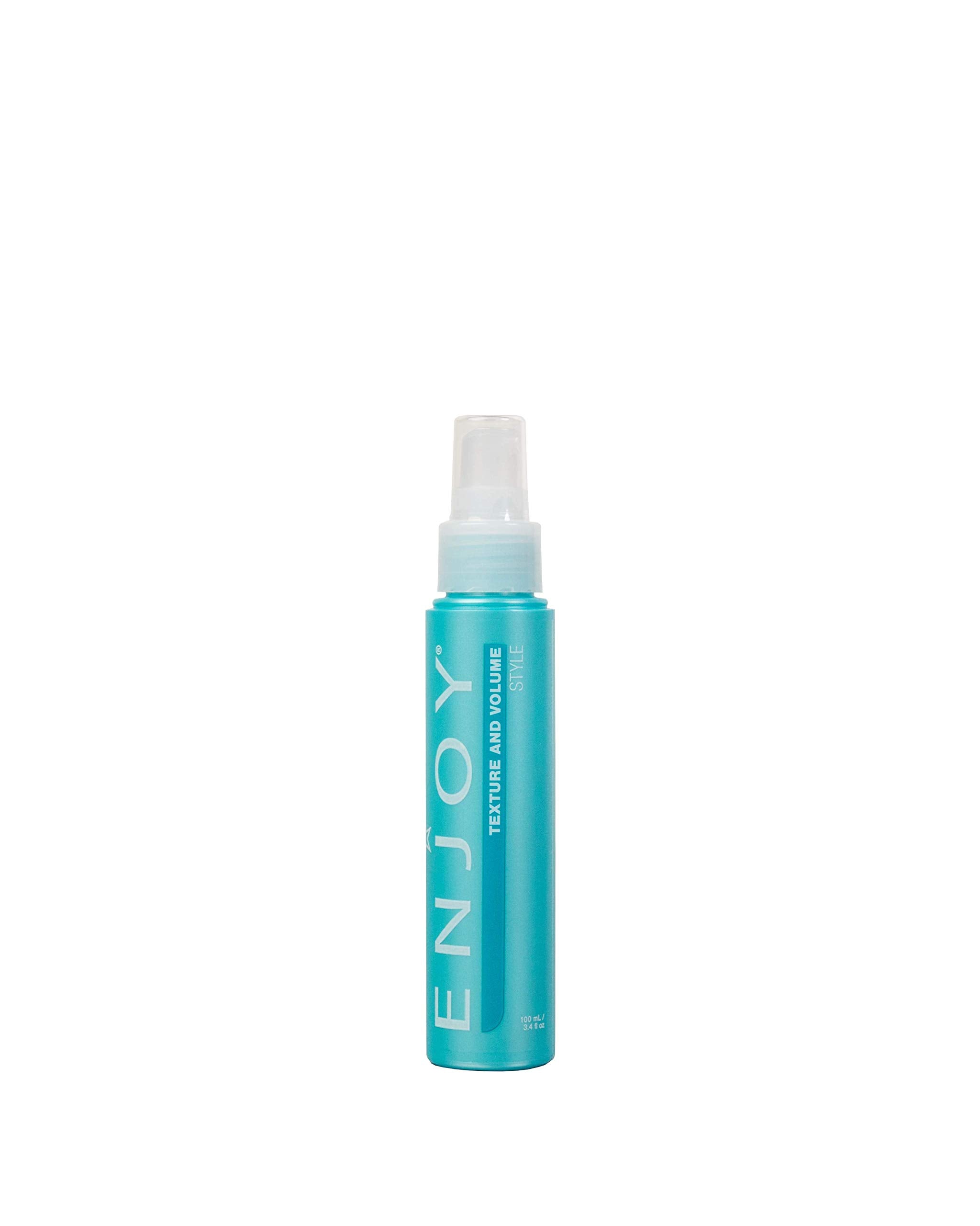 Enjoy Texture and Volume Spray bottle closeup shows curl volume benefits.
