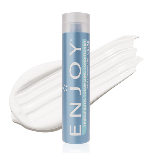Enjoy Therapeutic Volumizing Conditioner bottle side shows sleek packaging and fuller hair potential.