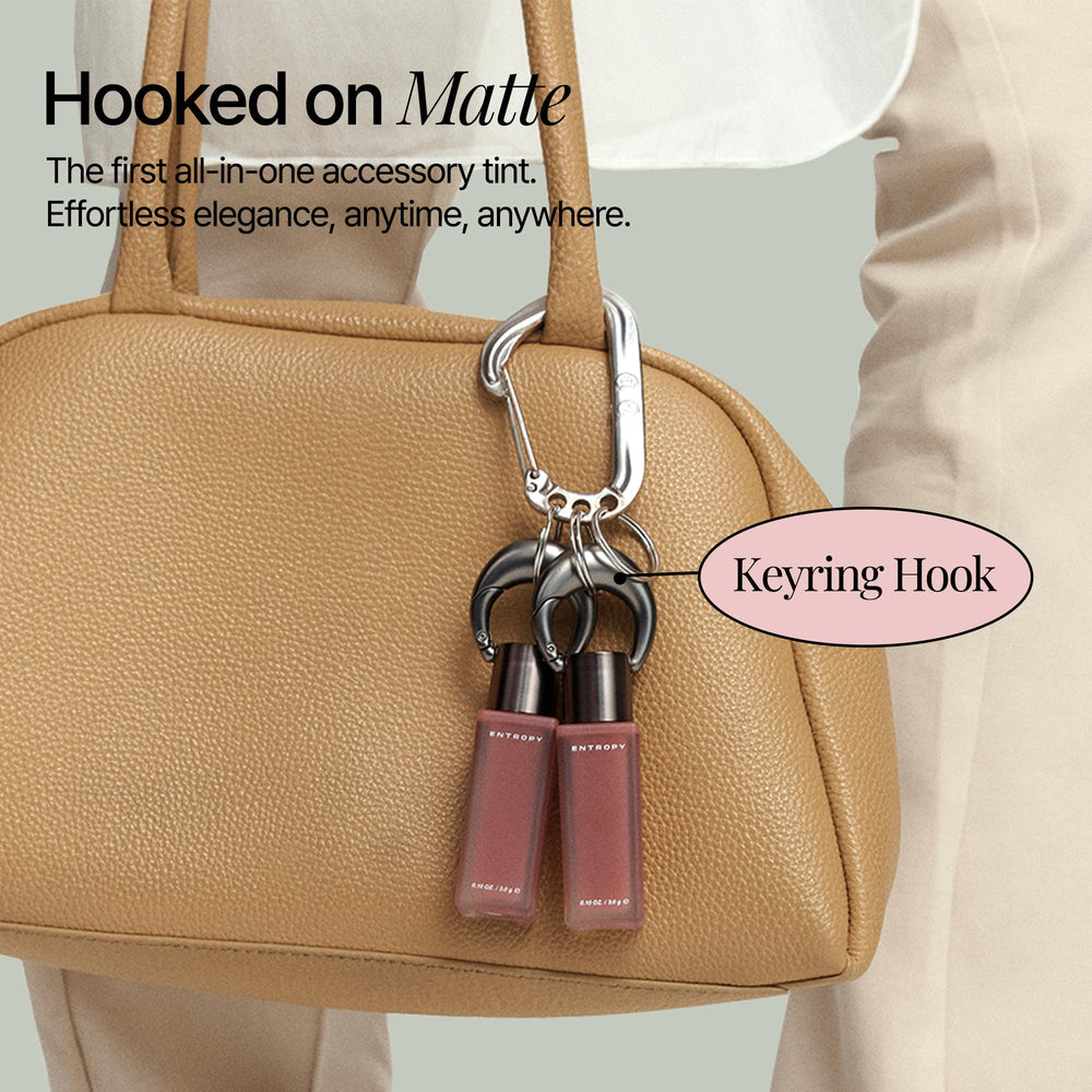 Entropy Charm Tint portable bottle for quick lip touch-ups.