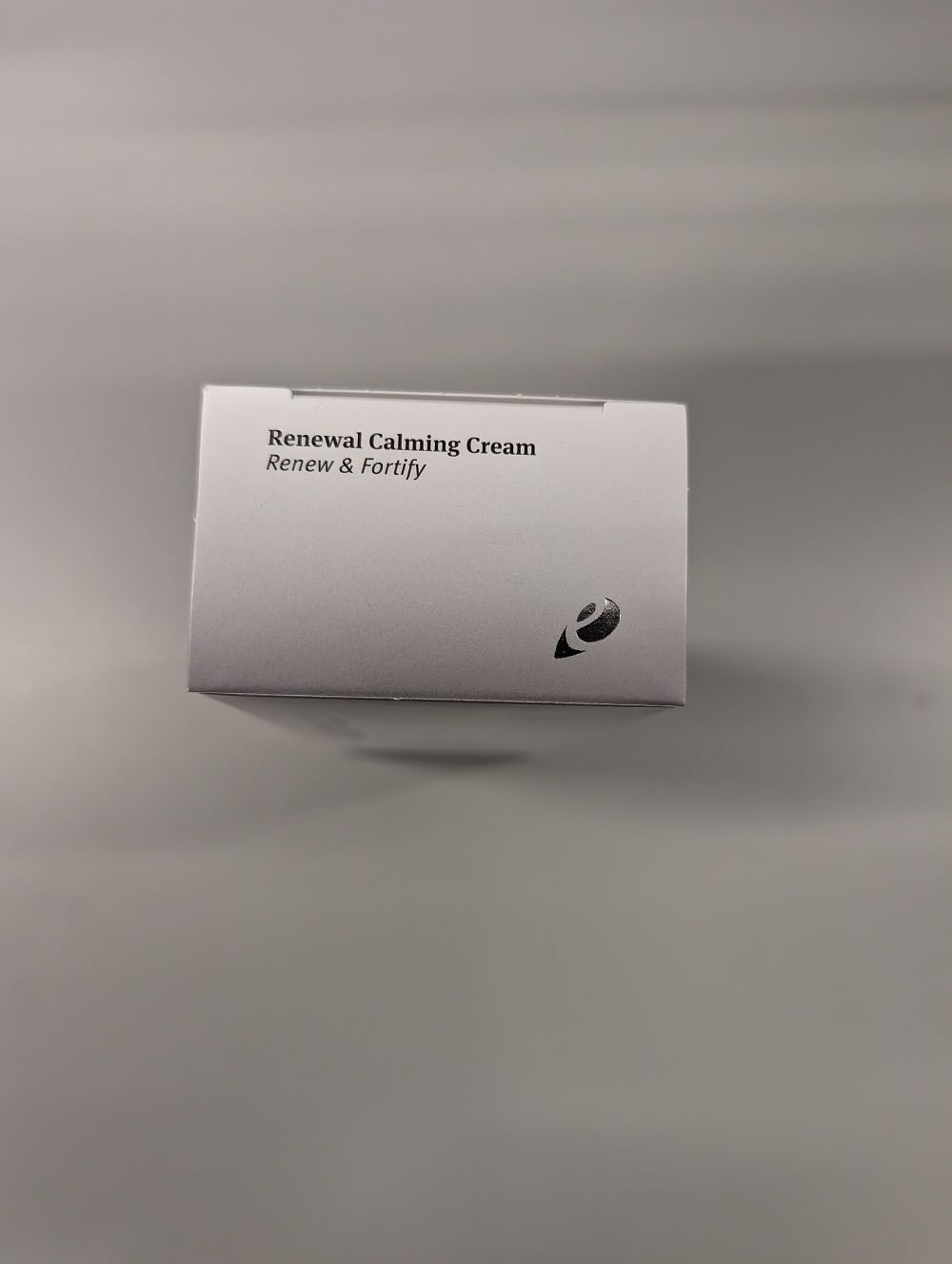 Epionce Renewal Calming Cream texture-closeup highlights creamy consistency.