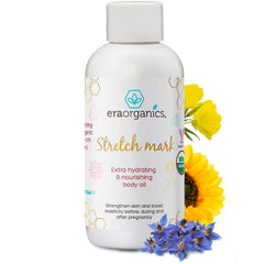 Era Organics stretch mark oil bottle pouring onto moisturized belly for pregnancy care
