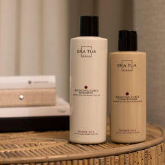 ERA TUA Tender Silk Bouncing Curls Shampoo packaging close-up hints premium design.