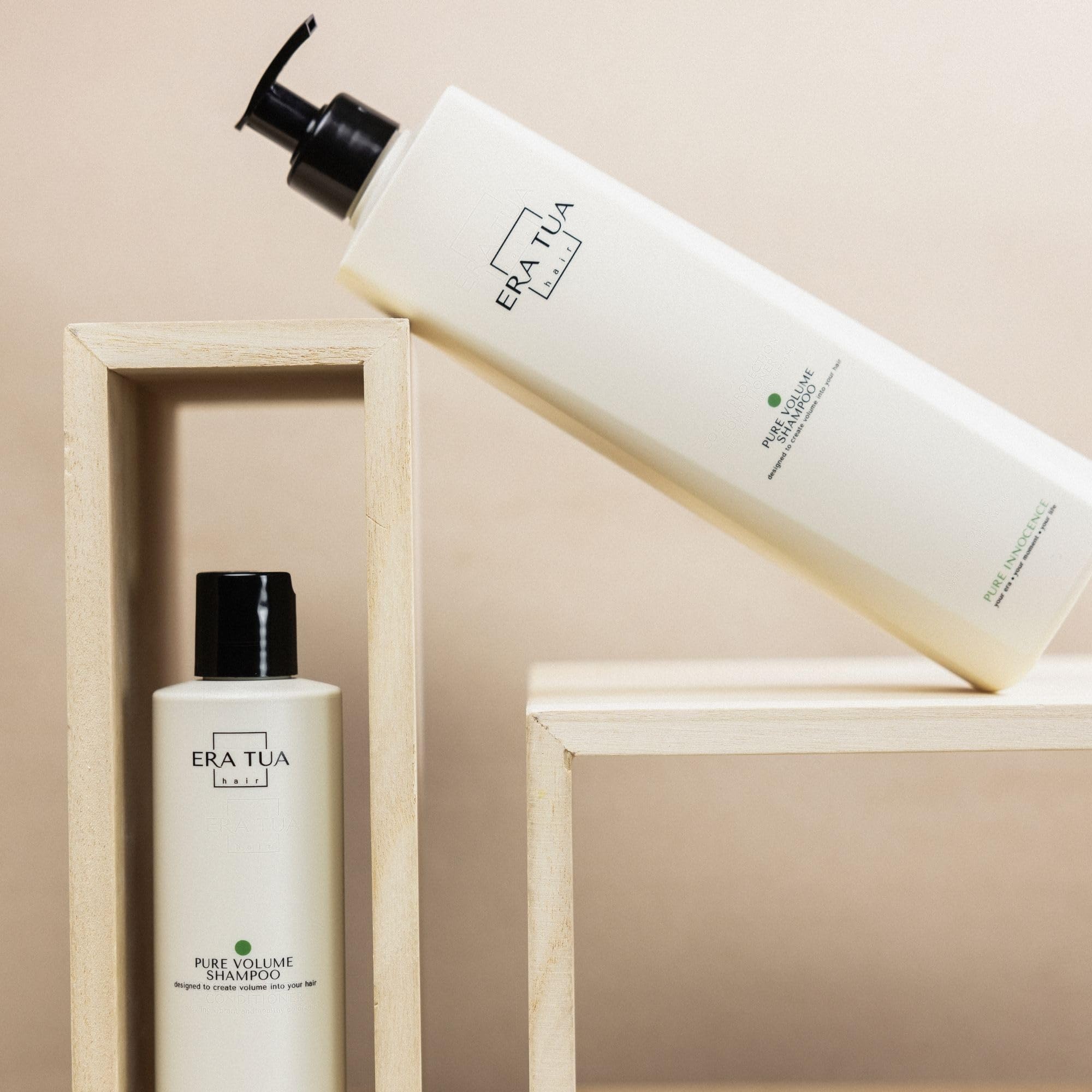ERA TUA Pure Innocence Volume Shampoo bathroom scene showing packaging