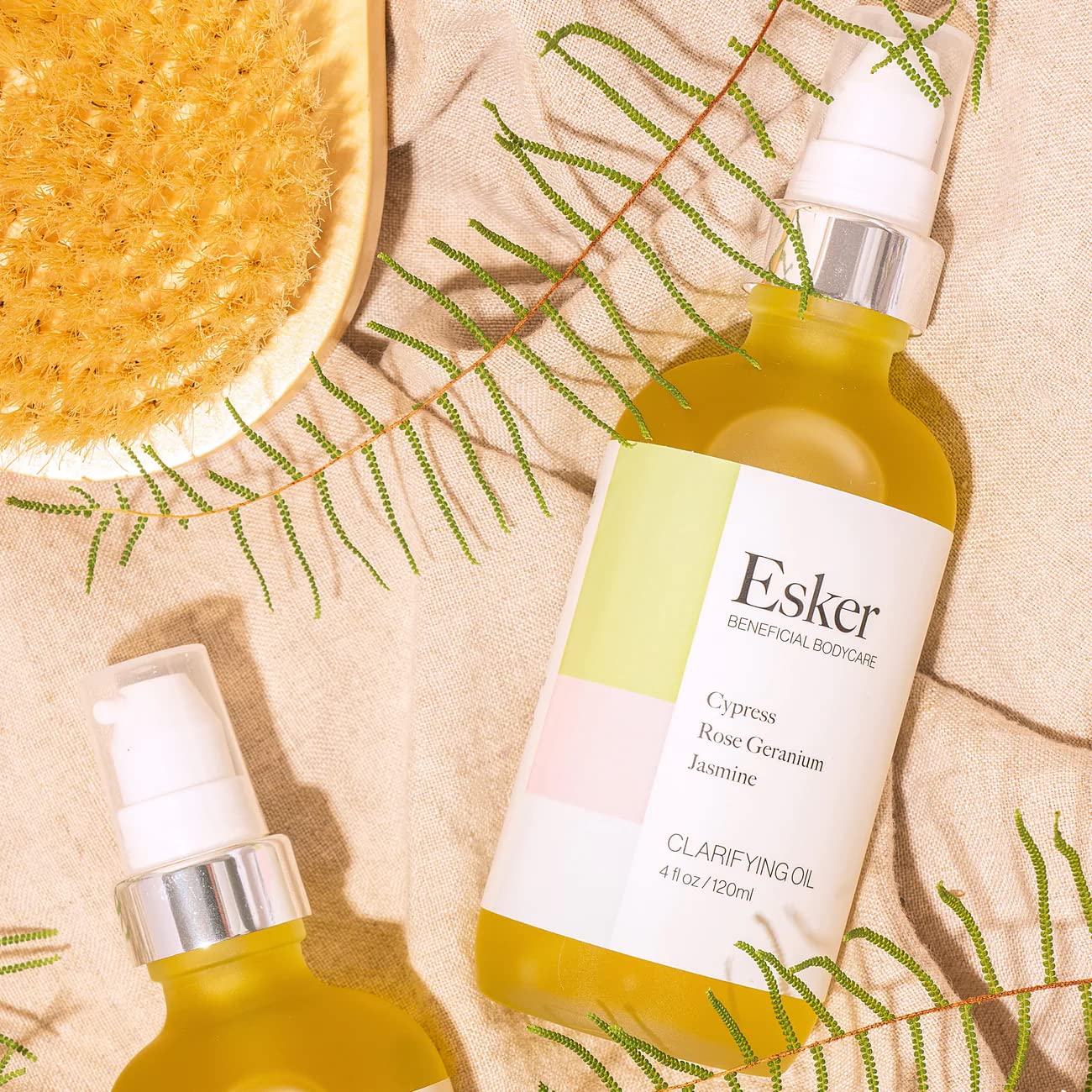 Close-up of Esker Clarifying Body Oil texture shows light, fast-absorbing nourishment.