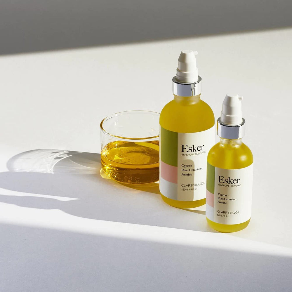Spa-like bathroom scene with Esker oil conveys calm, at-home self-care.