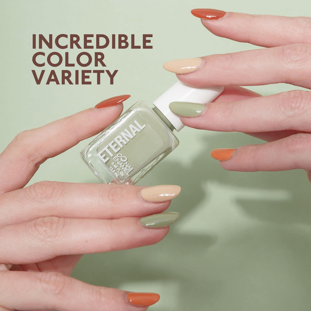 Eternal Safari orange nail polish offers a bold sunny accent.