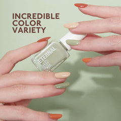 Eternal Safari orange nail polish offers a bold sunny accent.