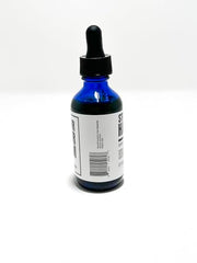 Evan Alexander Hair Repair Serum being applied to scalp for nourishment.