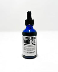 Evan Alexander Rosemary oil bottle highlighting natural ingredients.
