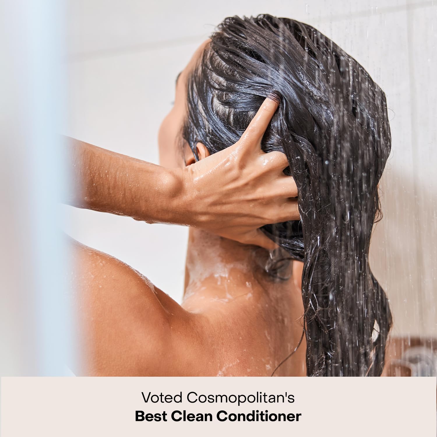 Everist Deep Conditioning Concentrate bottle closeup highlights vegan formula for frizz control.