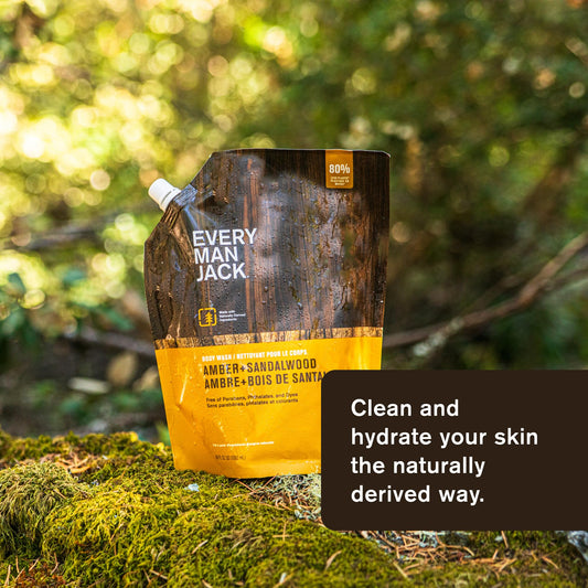 Every Man Jack Amber Sandalwood refill pouch opened to refill bottle and reduce waste.