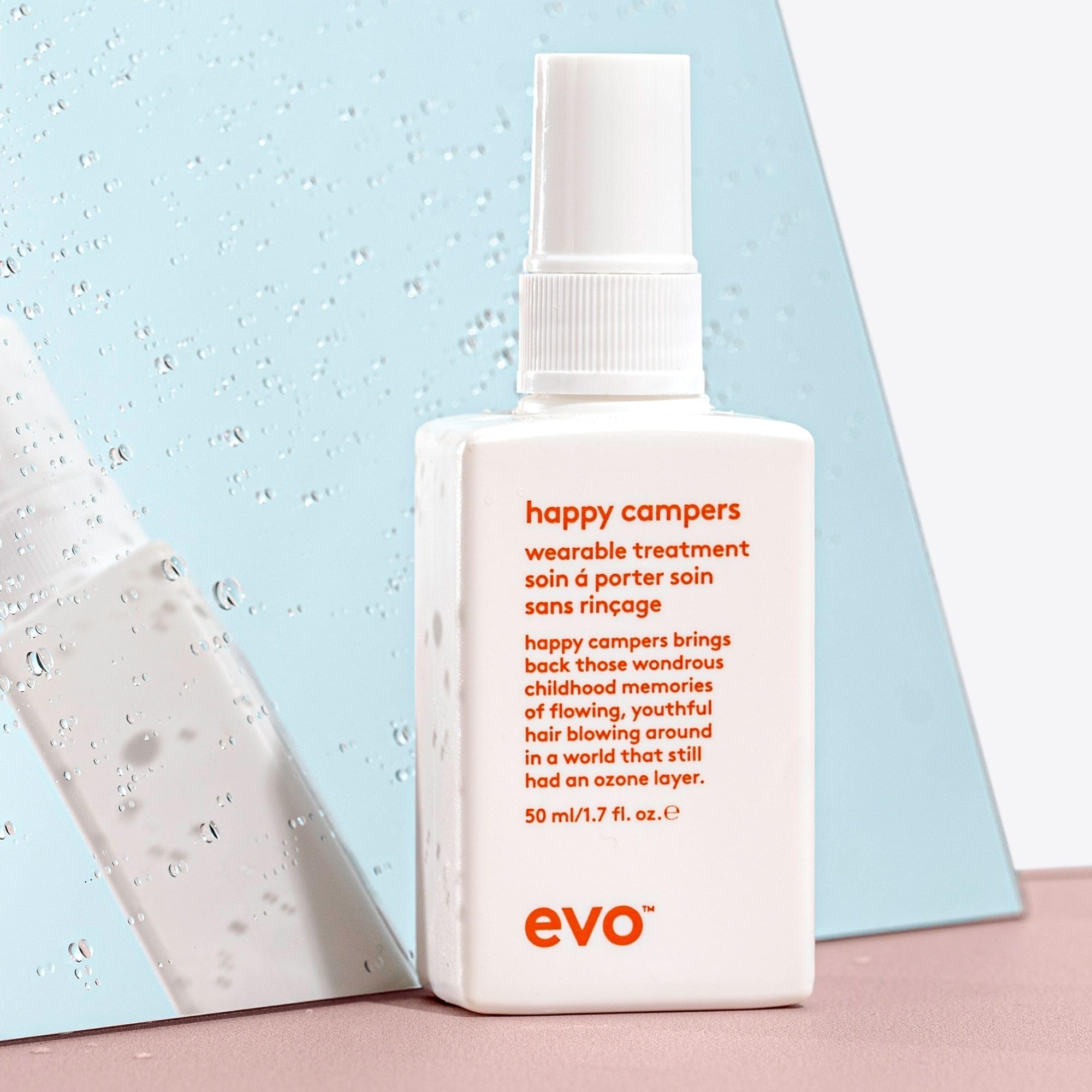 Damp hair with EVO Happy Campers for a style-ready finish