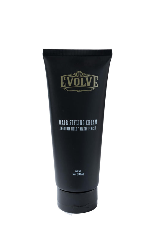 Evolve Hair Styling Cream tube shown for versatile, non-greasy hold and matte finish.