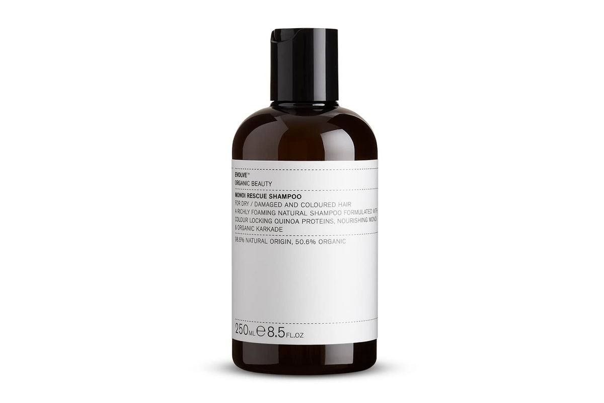 Evolve Organic Beauty Monoi Rescue Shampoo bottle pour demonstrates easy application and hydration