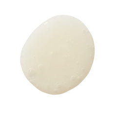 Evolve Organic Beauty Monoi Rescue Shampoo label detail highlights natural, vegan ingredients