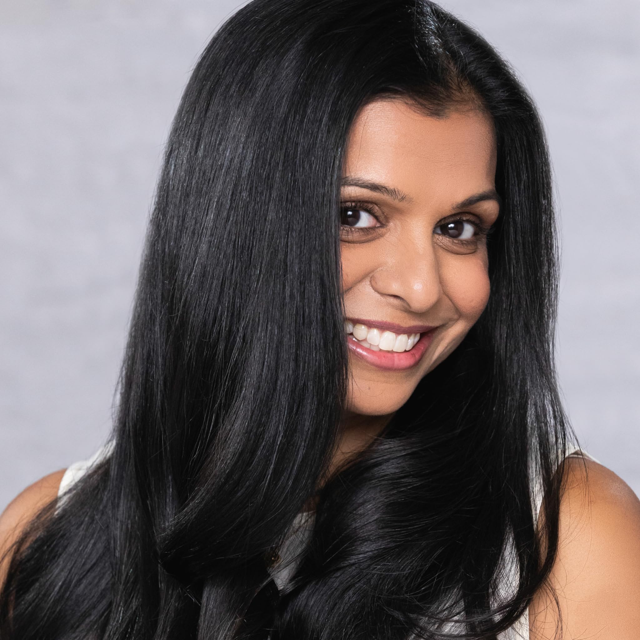 Hair with improved manageability after EVOLVh UltraShine treatment with key actives.